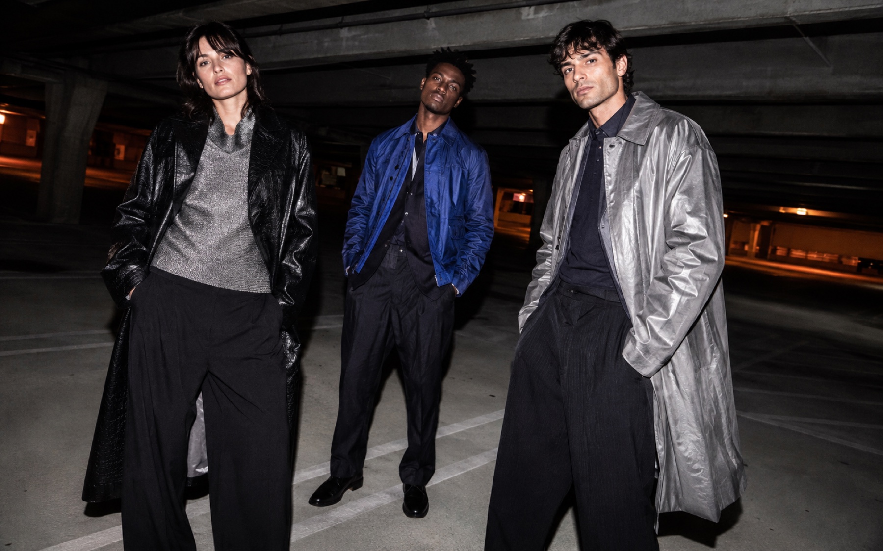 Fashion models photographed with hard direct flash in a parking structure